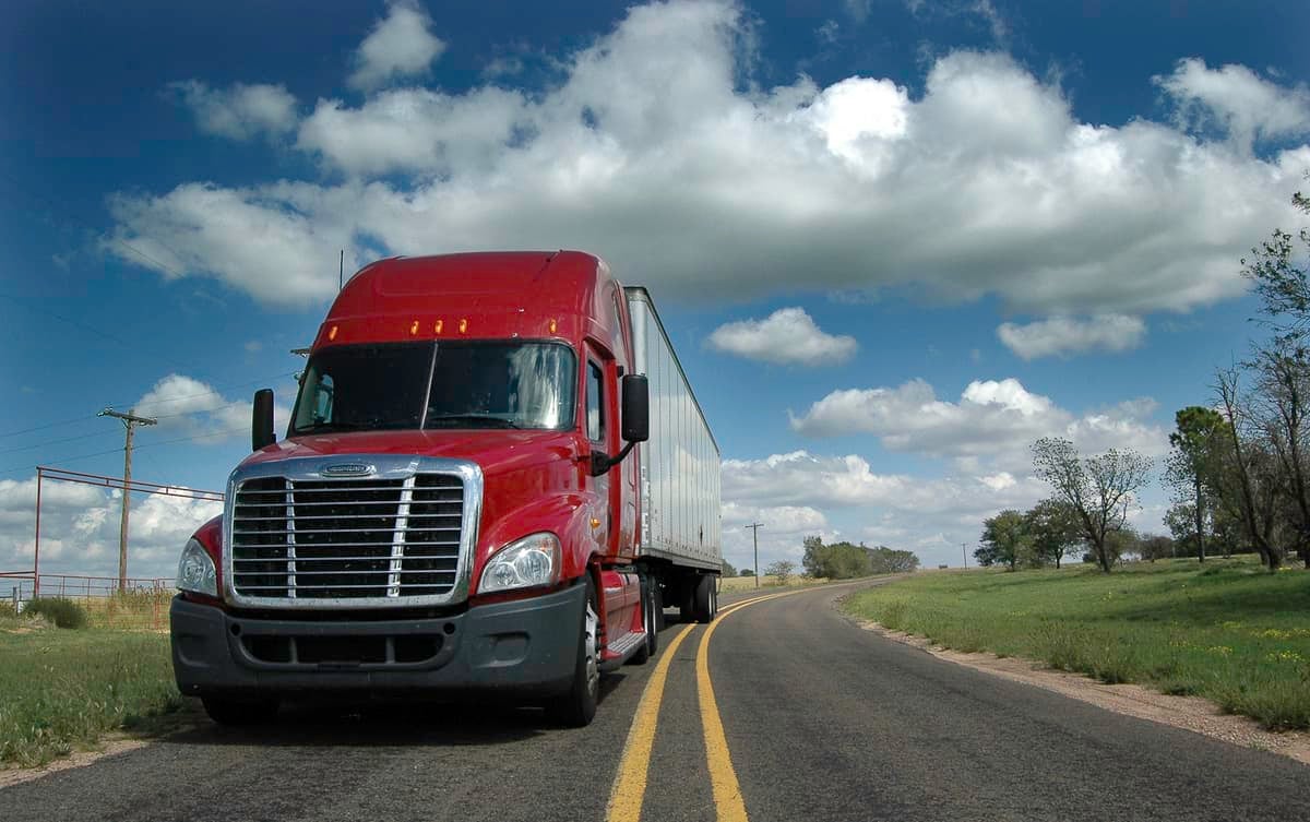 truck driving down highway