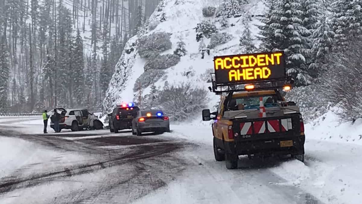 Accident on snowy Oregon highway.