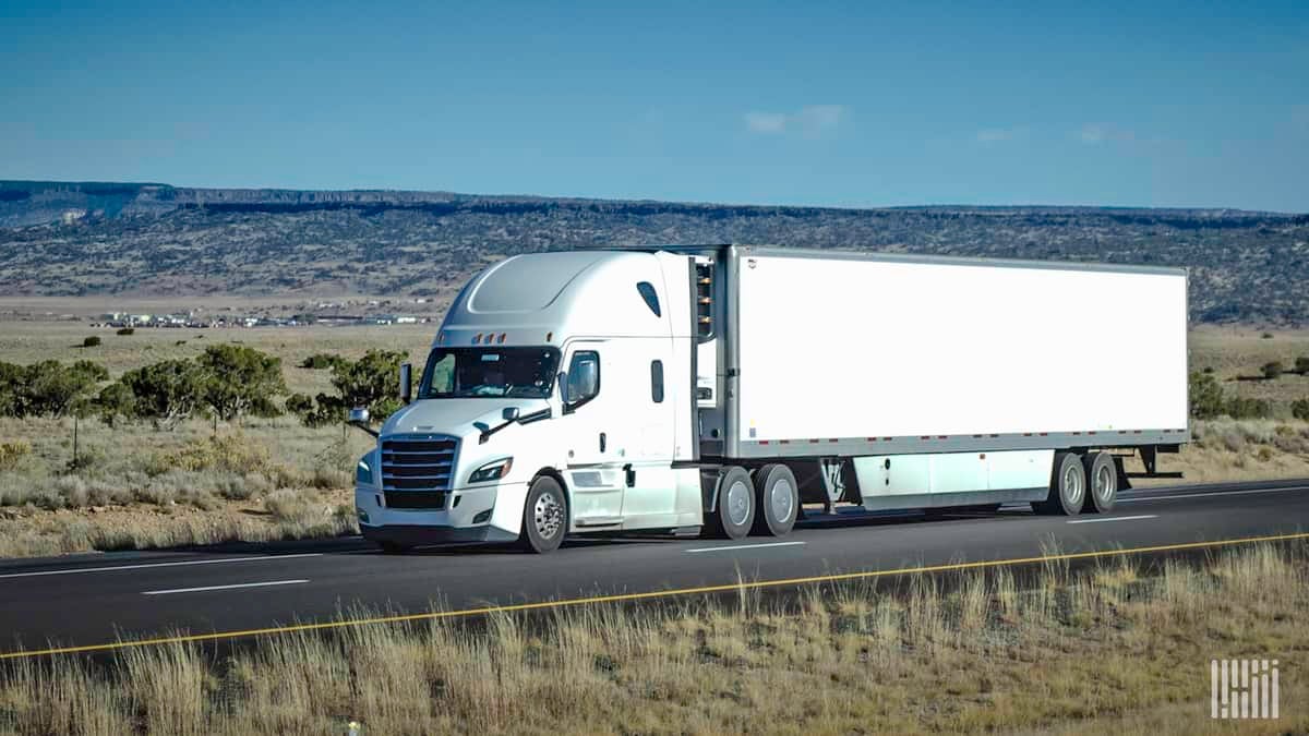 Truck drives down highway