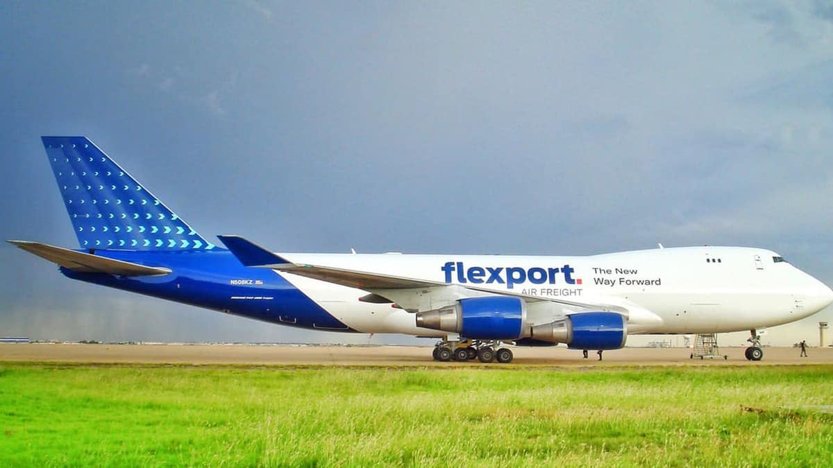 Blue jumbo jet on taxiway