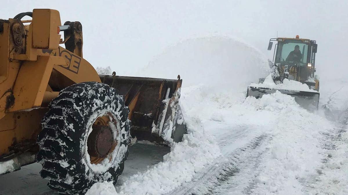 Plow on snowy road in Washington State.