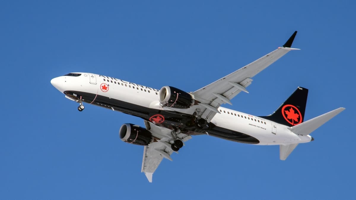 An Air Canada jet flying overhead