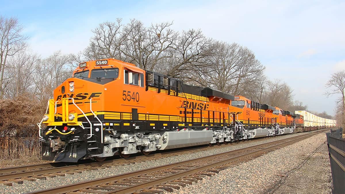 A photograph of a train hauling intermodal containers.