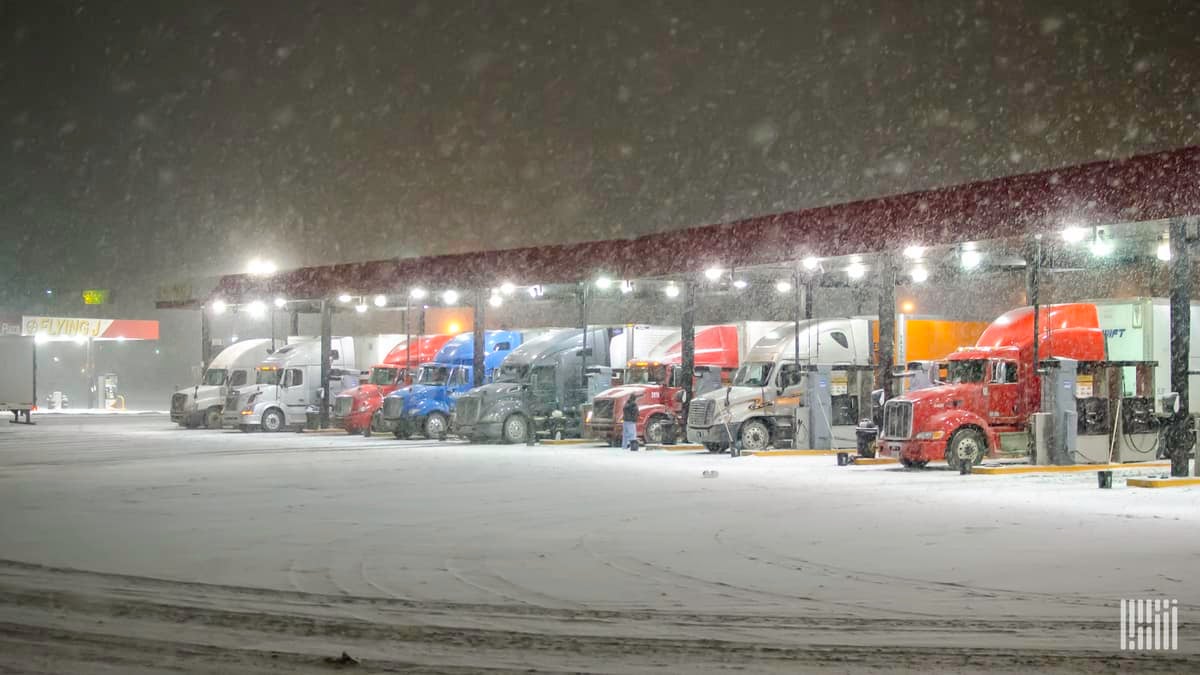 Trucks fueling at travel center