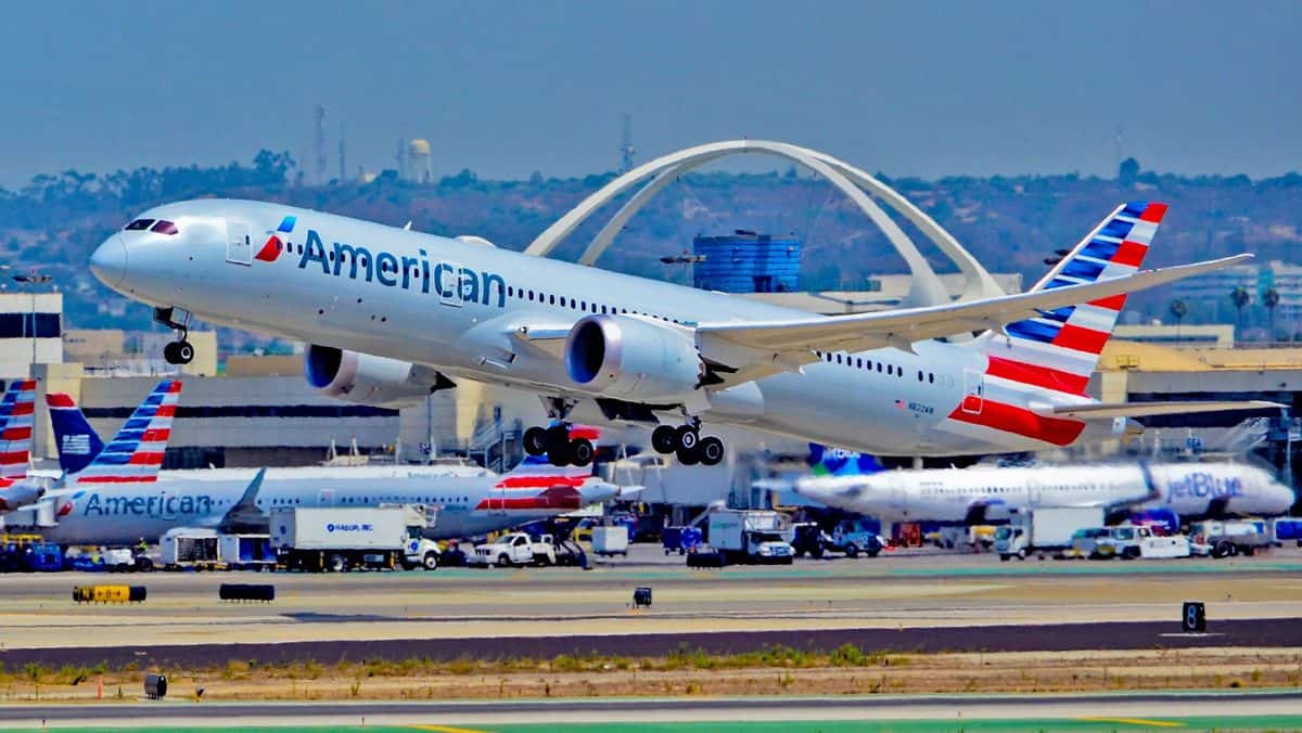 Big silver plane takes off from Los Angeles Airport