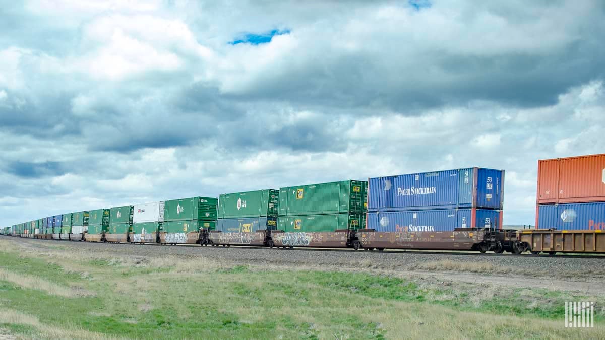 A photograph of a train carrying intermodal containers.