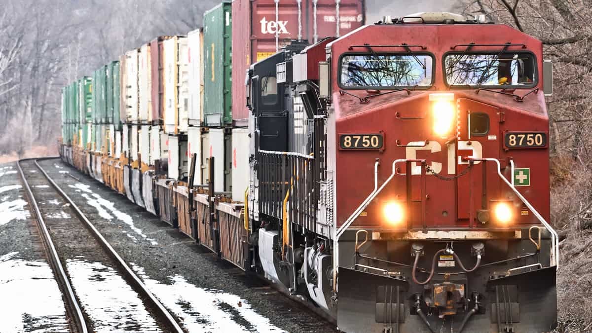 A photograph of a train hauling intermodal containers.