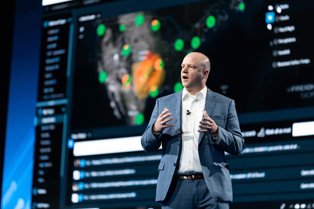 Craig Fuller, founder and CEO of FreightWaves, with a SONAR screen behind him. (Photo: FreightWaves)