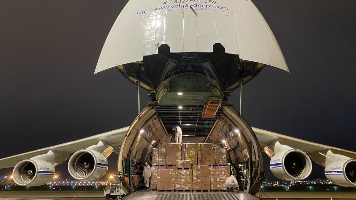 The tail lifted on a massive Antonov freighter.