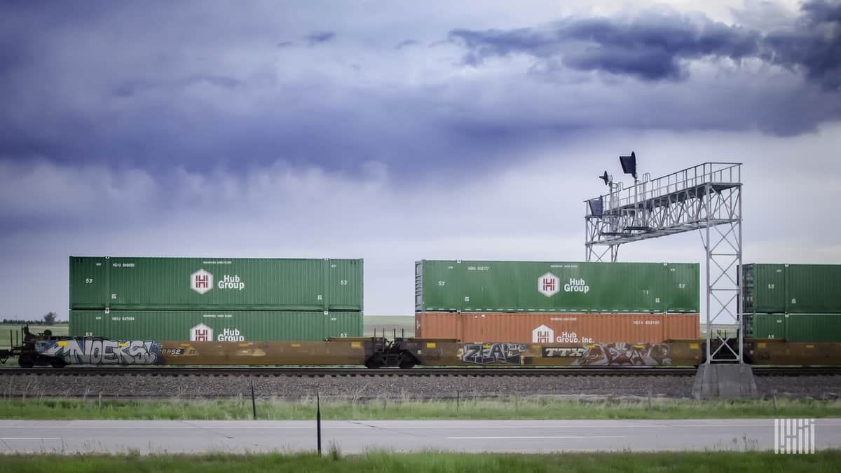 double stacked containers on intermodal well car