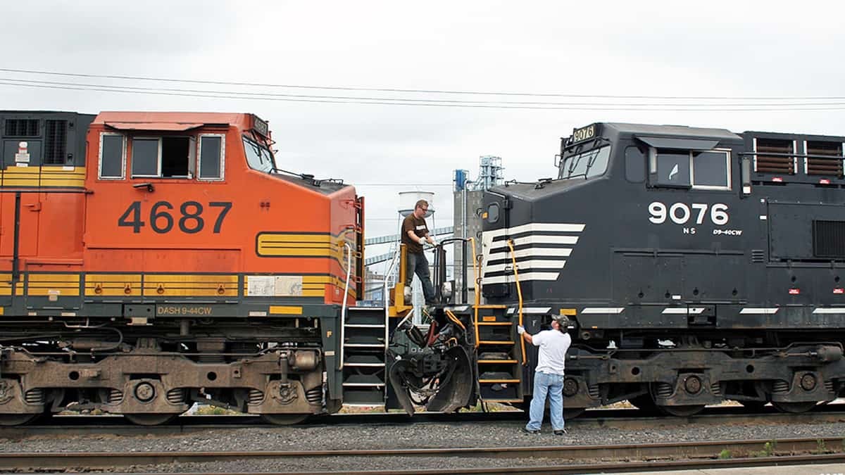 A photograph of two train locomotives.