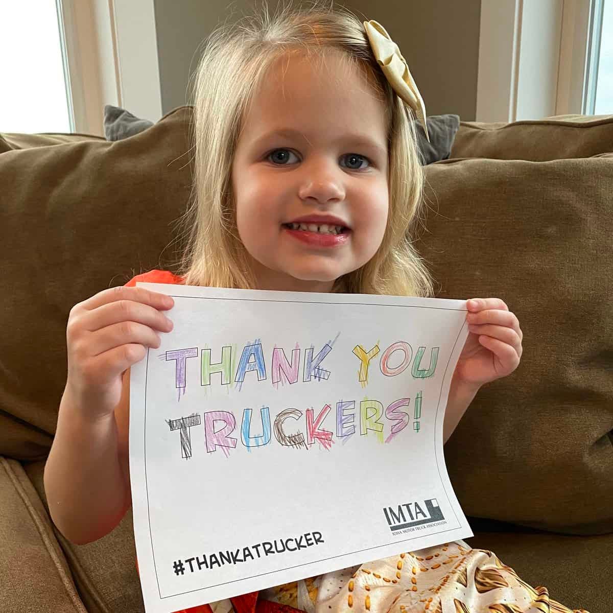 Little girl with poster