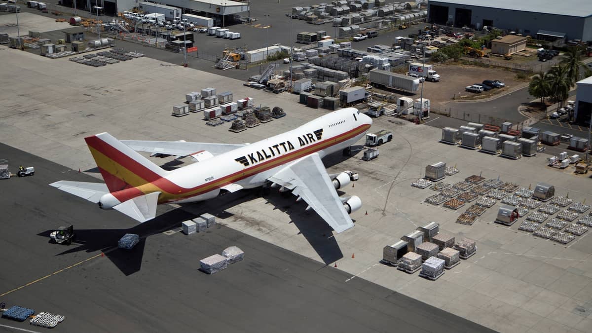 A large cargo aircraft parked at an airport.