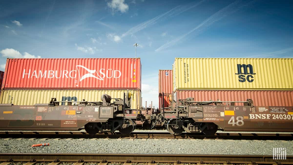 A photograph of intermodal containers at a rail yard.