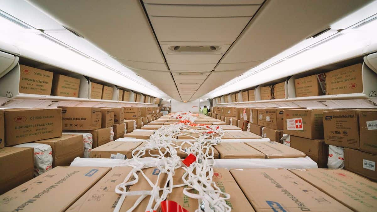 Lots of boxes, instead of people, fill the passenger cabin of plane.