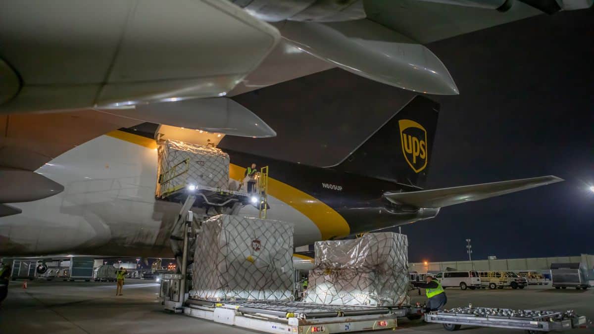 UPS plane gets unloaded at night.