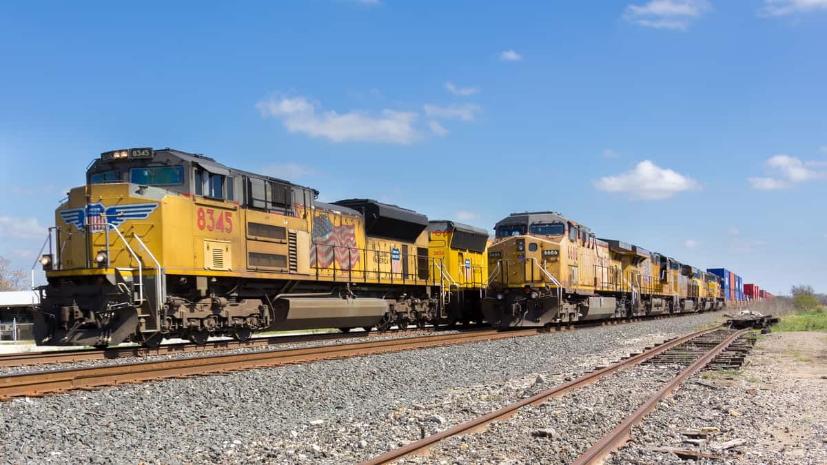 A photograph of two trains next to each other.