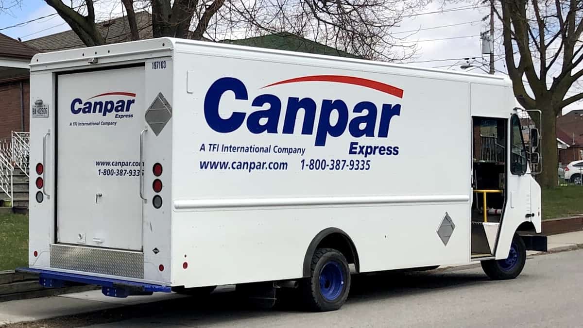 A van from TFI's Canpar stops for a delivery in Toronto, Canada,