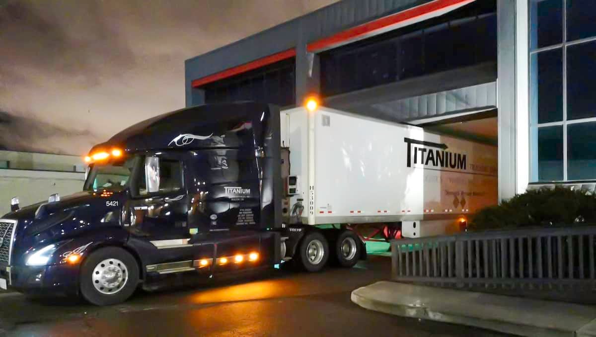 A tractor-trailer of Canadian trucking company Titanium Transportation Group delivering a truckload of N95 masks