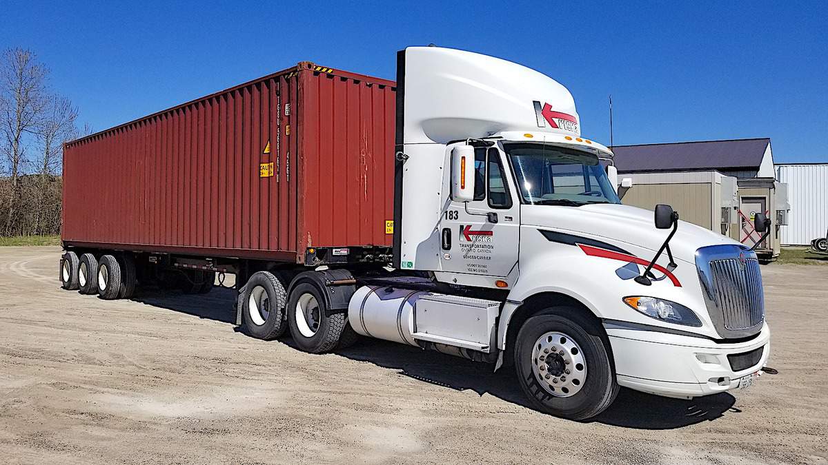 A Kriska tractor hauling an intermodal container.