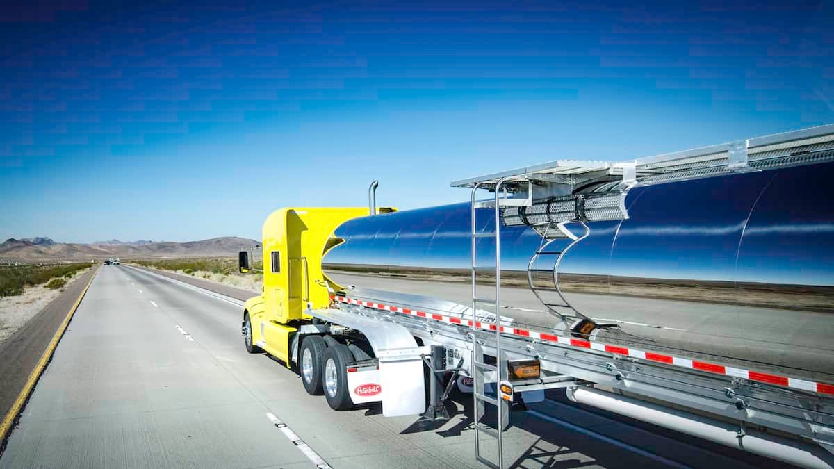 A tractor hauls a tanker trailer.