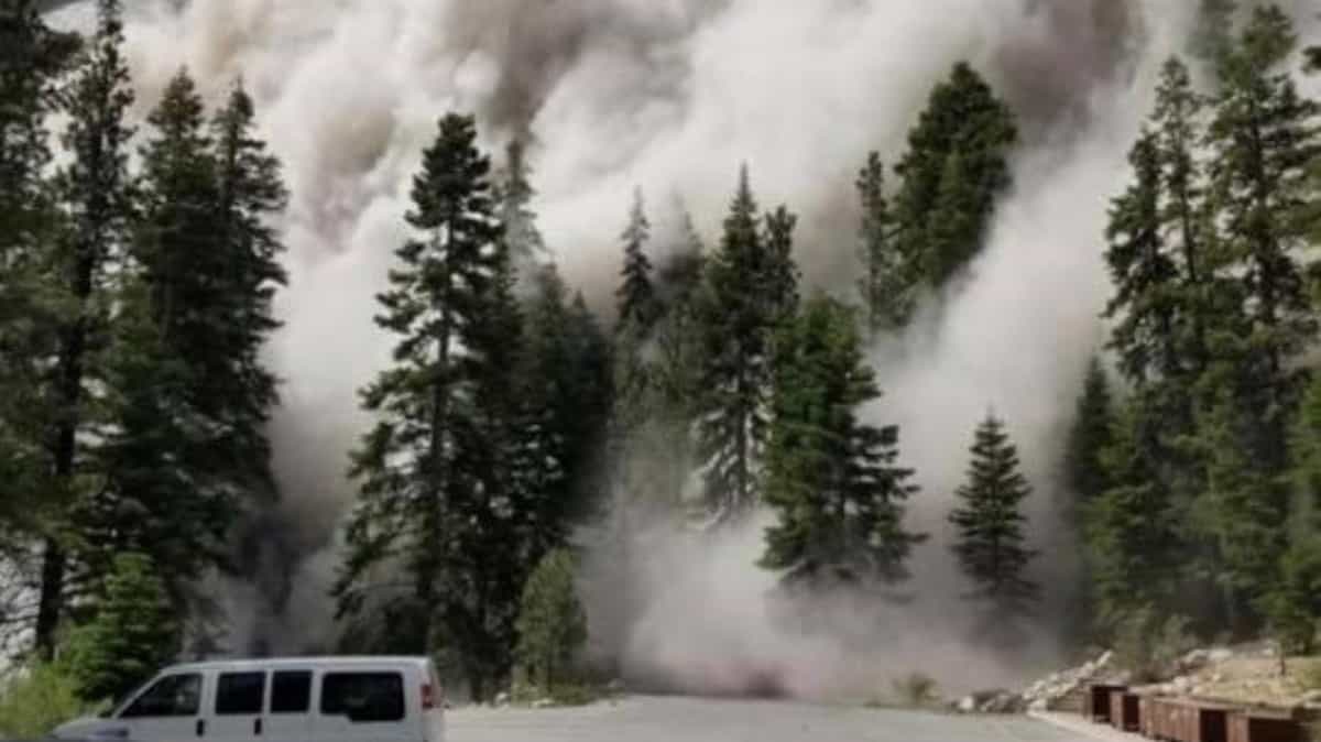 Dust clouds roll down California mountainside during June 24 earthquake.