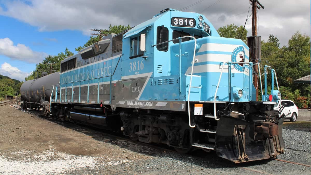 A photograph of a train locomotive outdoors on a track.