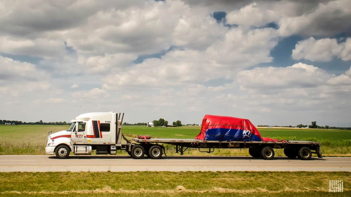 Daseke flatbed on highway