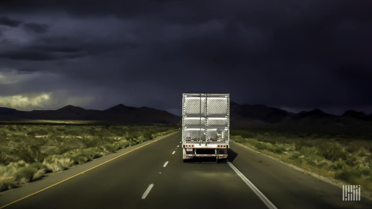 truck traveling down highway