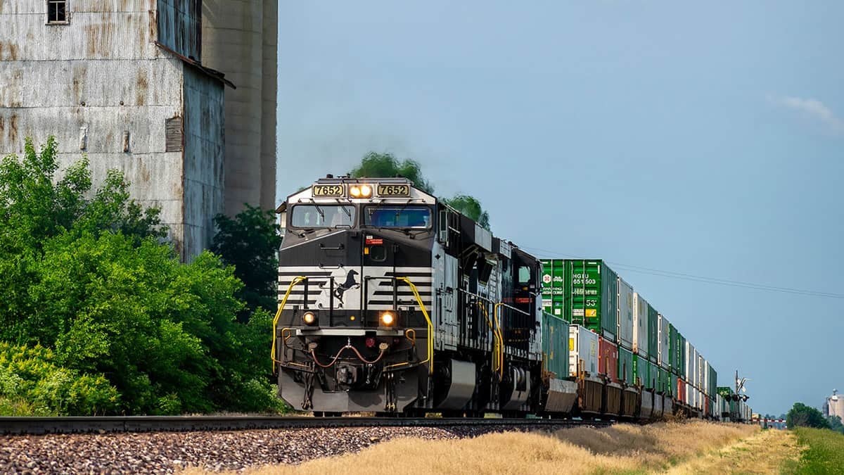 A photograph of a train hauling intermodal contrainers.