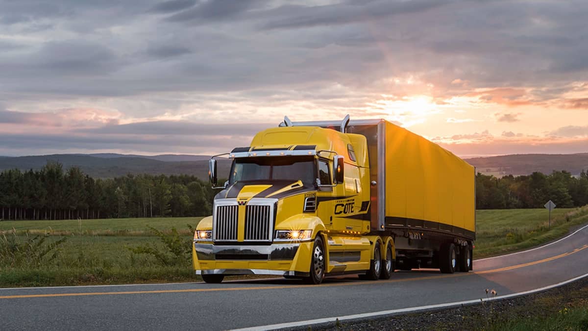 Yellow Western Star truck on aroad