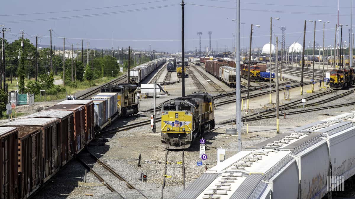 A photograph of a Union Pacific train in a rail yard.