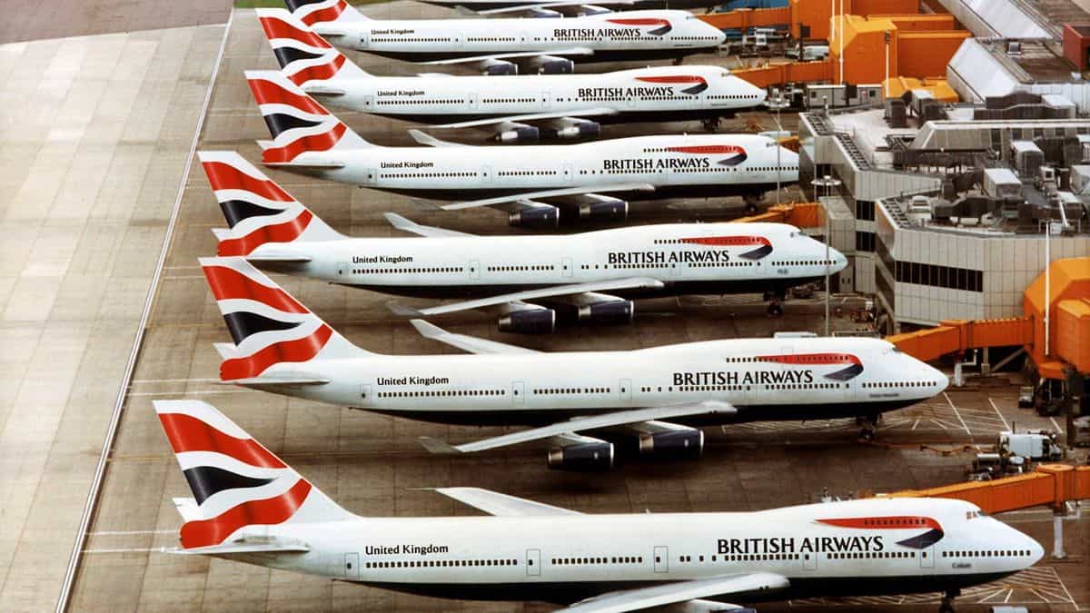 British Airways 747-400 jumbo jets lined up at the airport gate. British Airways is retiring the planes, which were not the most efficient from a fuel or cargo perspective.