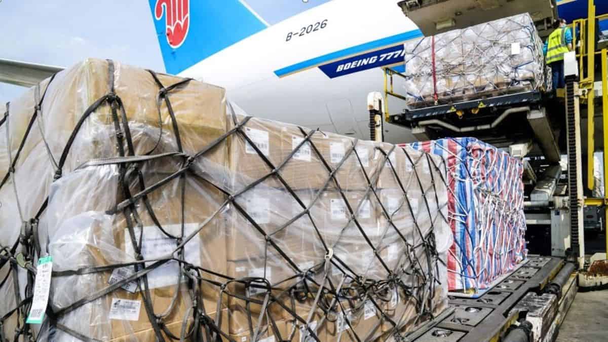 Cargo pallets come off a the rear door of a big cargo plane. China cargo capacity is shrinking and rates are going back up, according to the latest data.