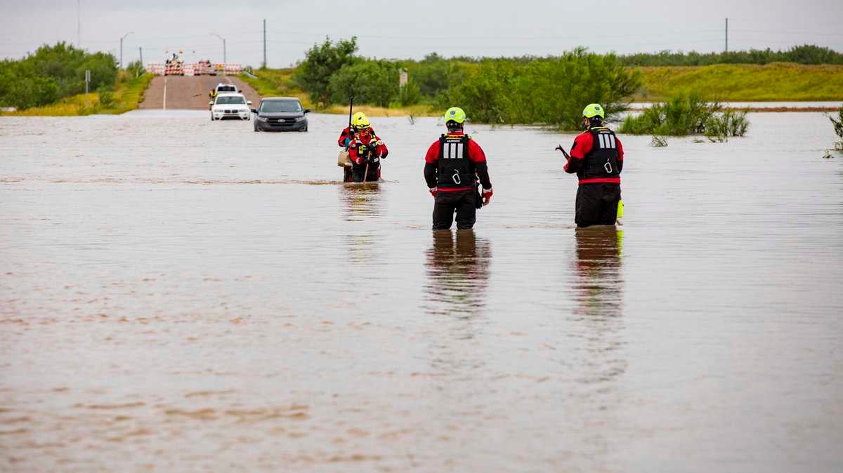 Rescue team in McAllen Texas flood waters.