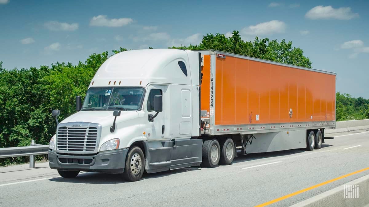 A power-only carrier pulls a Schneider trailer.