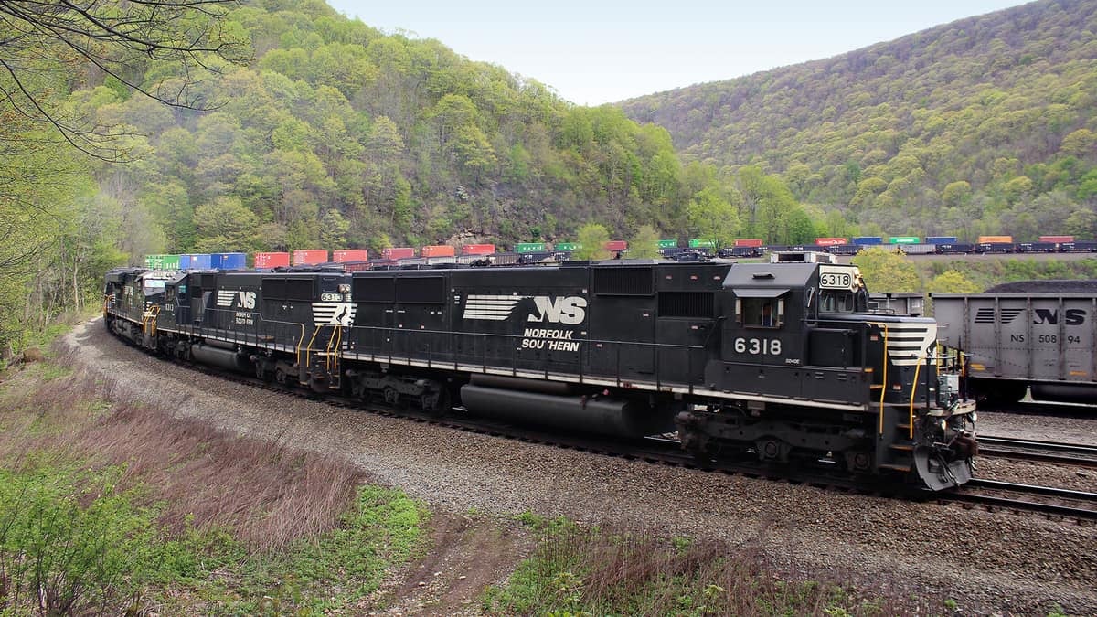 A photograph of a Norfolk Southern train hauling intermodal containers.