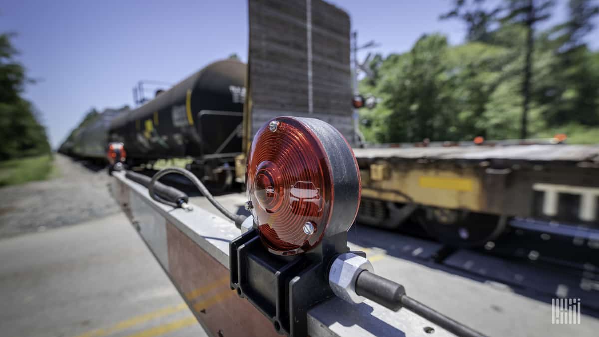 A close-up photograph of a rail crossing.