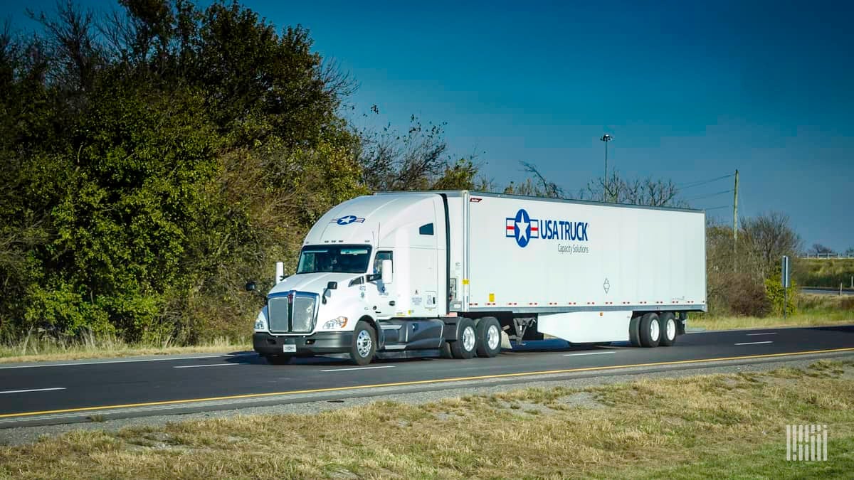 USA Truck rig in transit on highway