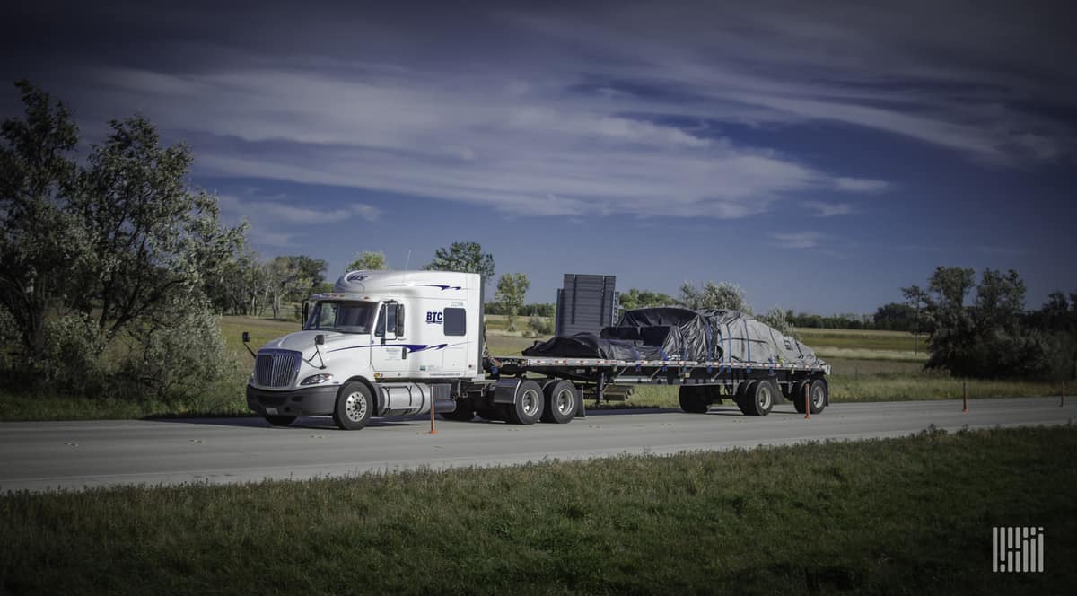 Builder's Transportation, a Daseke company, flatbed rig on the highway