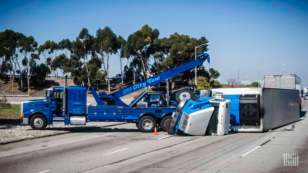 Tow truck responds to wreck.