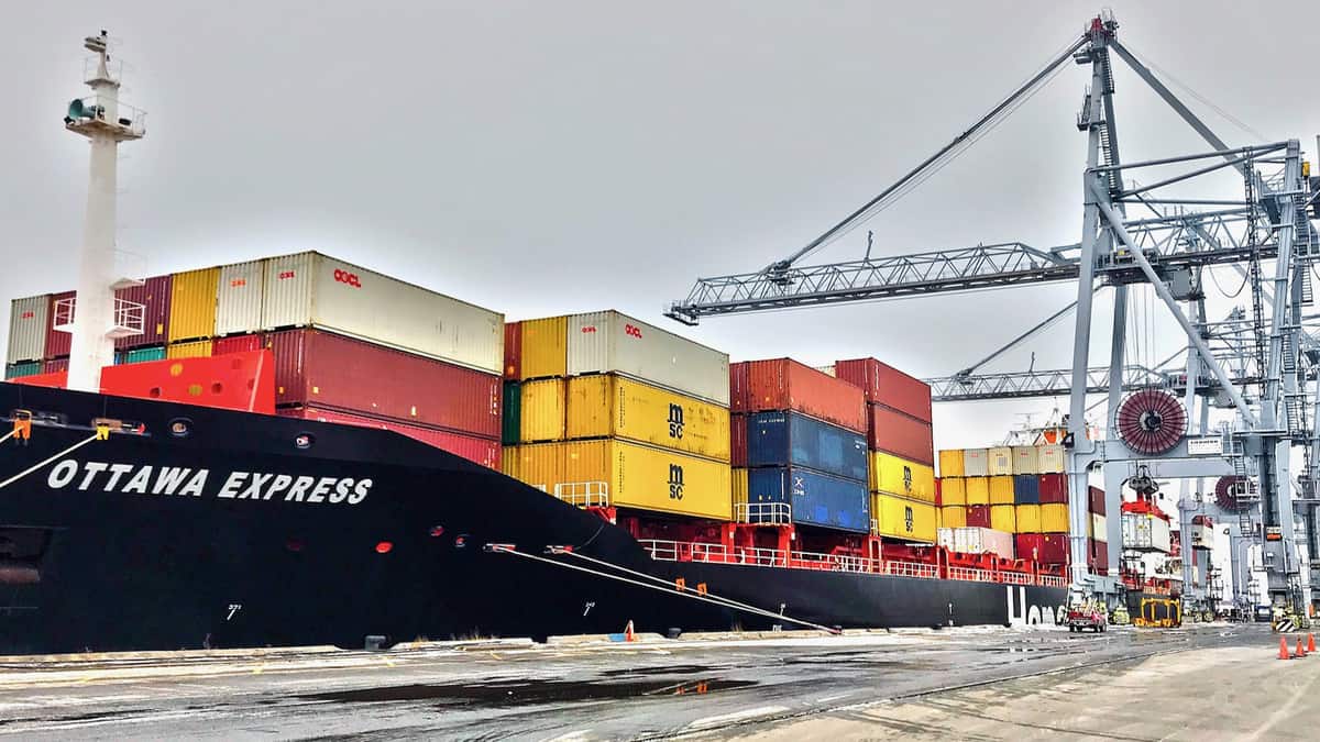 A container ship docked at the Port of Montreal. The port is expected to reopen on Sunday after an 11-day strike at the Port of Montreal