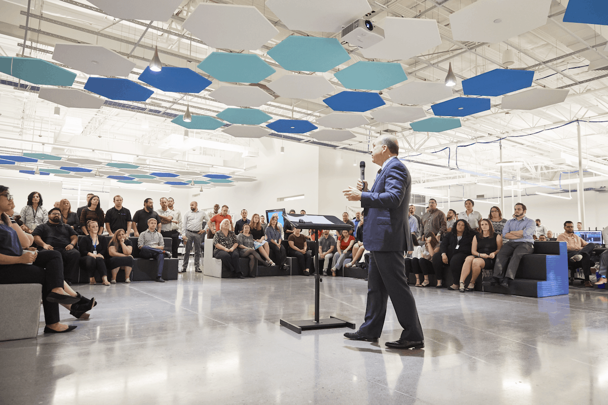 Bob Farrell speaks to GlobalTranz employees in 2018.