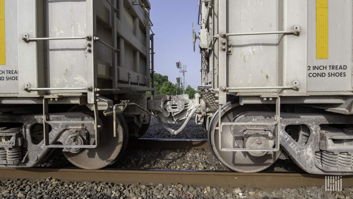 A photograph of two railcars connected to each other.