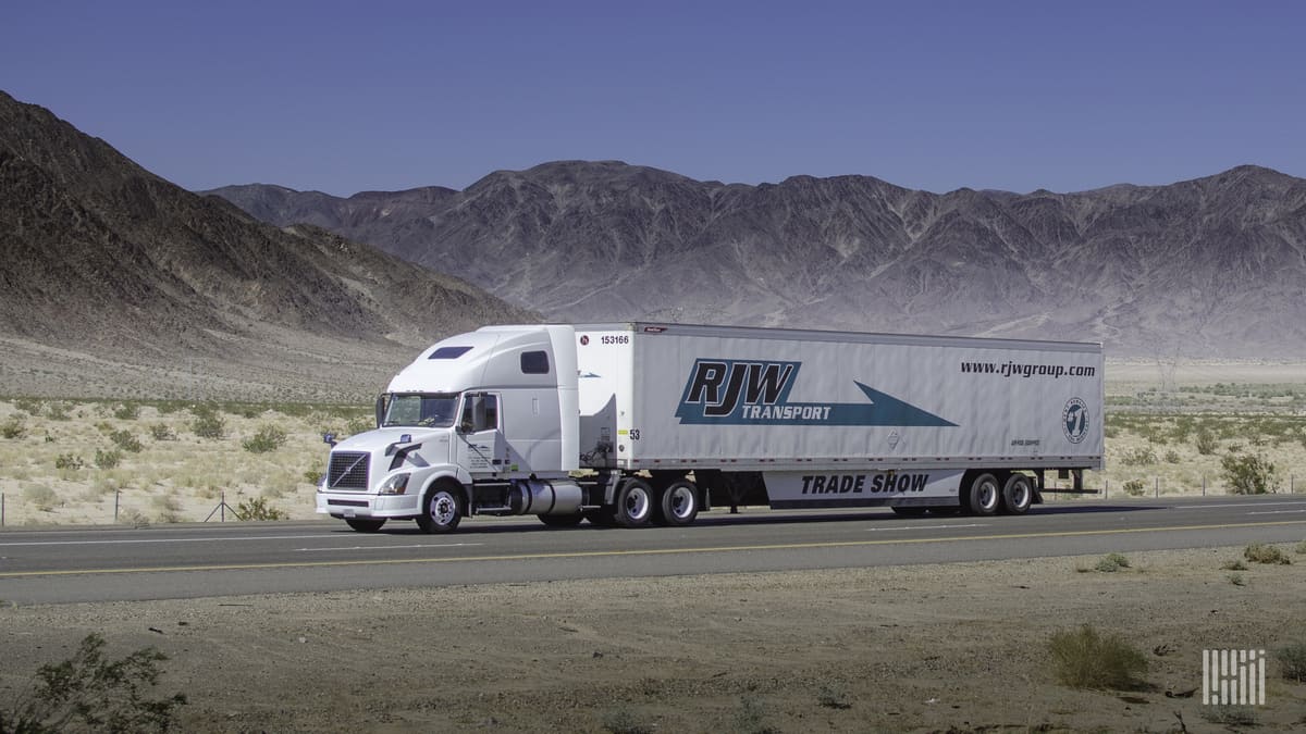 RJW Group truck on highway in mountains