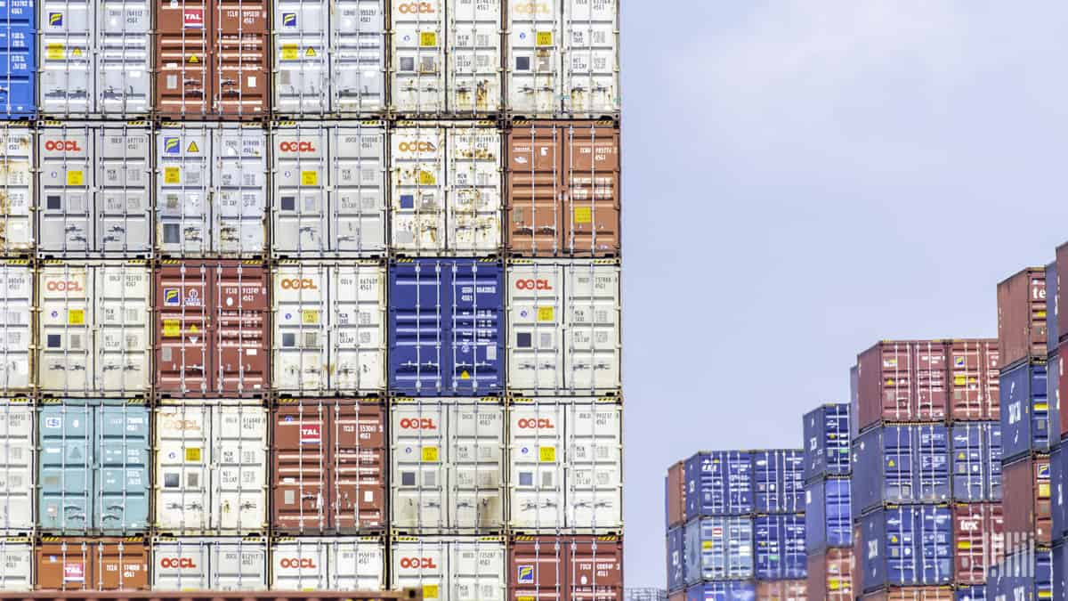 Containers stacked at a port. Descartes Systems reported a jump in Q2 profits on higher demand for supply chain software products.