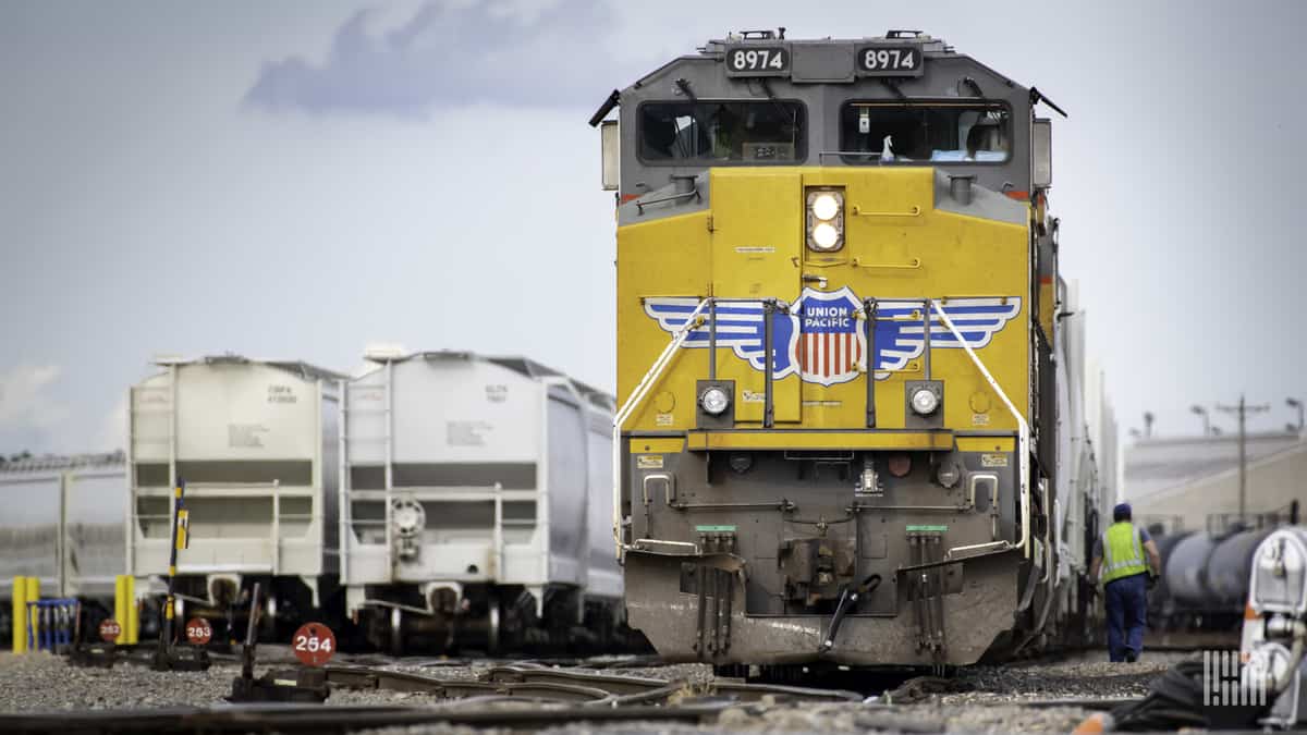 A photograph of a Union Pacific train at a rail yard.