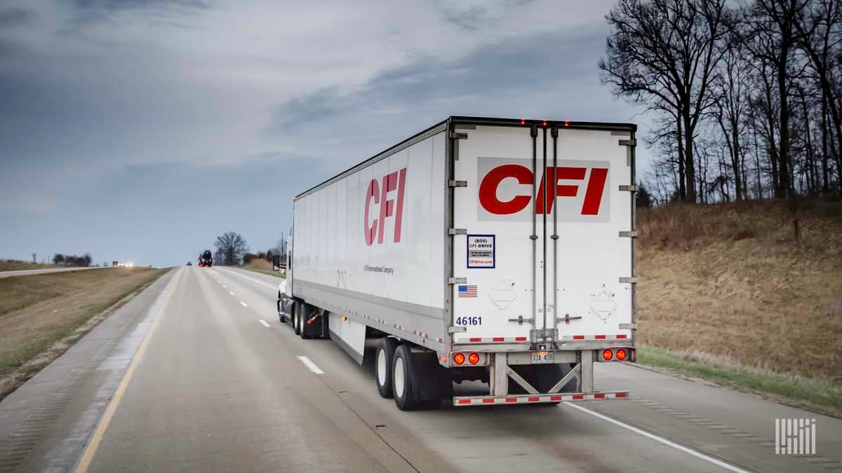 A tractor-trailer viewed from the year of TFI International trucking carrier CFI. TFI reported Q3 financial results on Thursday.