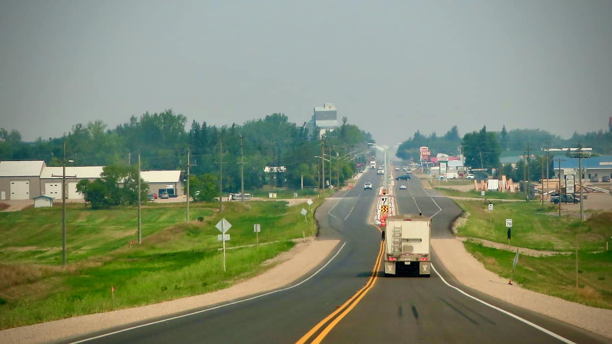 The view behind a truck moving on the road in Manitoba, Canada, where two trucking companies were recently placed into receivership