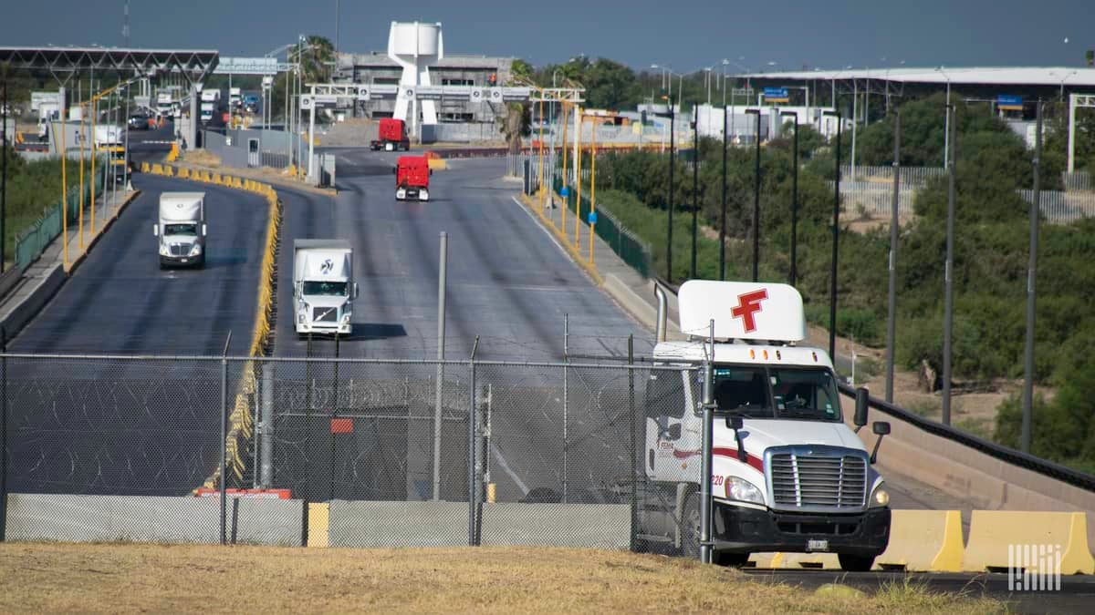 A view of trucks crossing the U.S.-Mexico border. Texas customs broker Daniel B. Hastings was recently targeted by ransomware hackers.